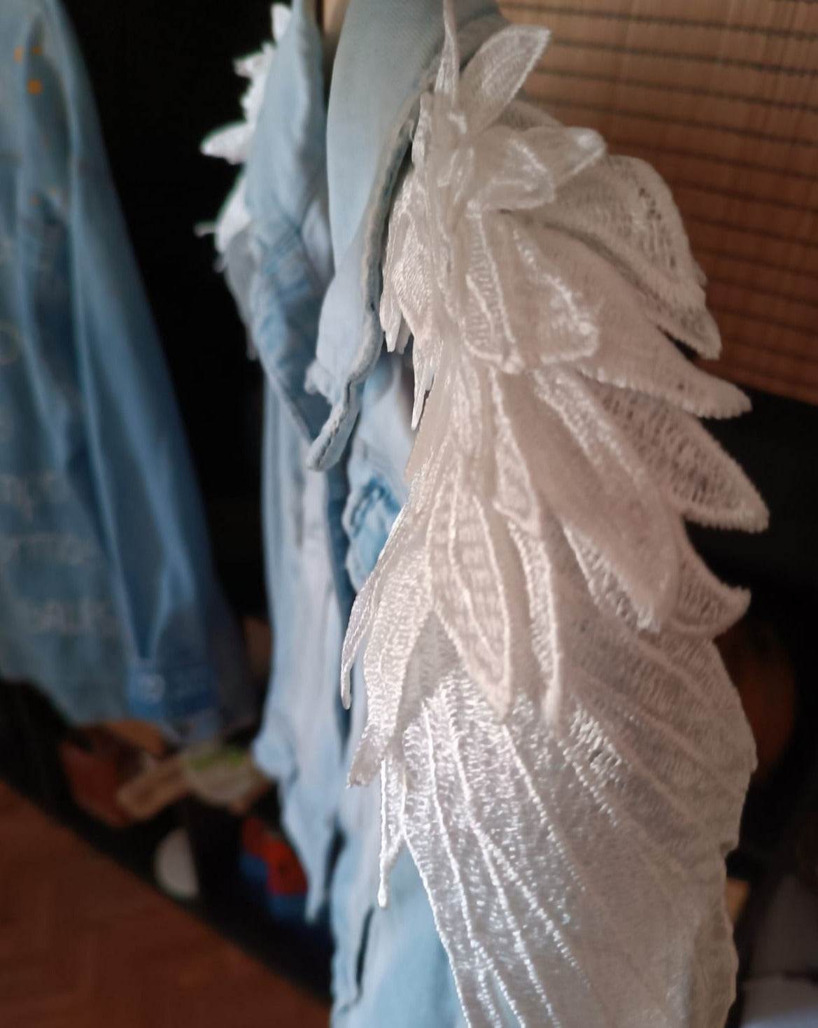 Lace embroidered wings